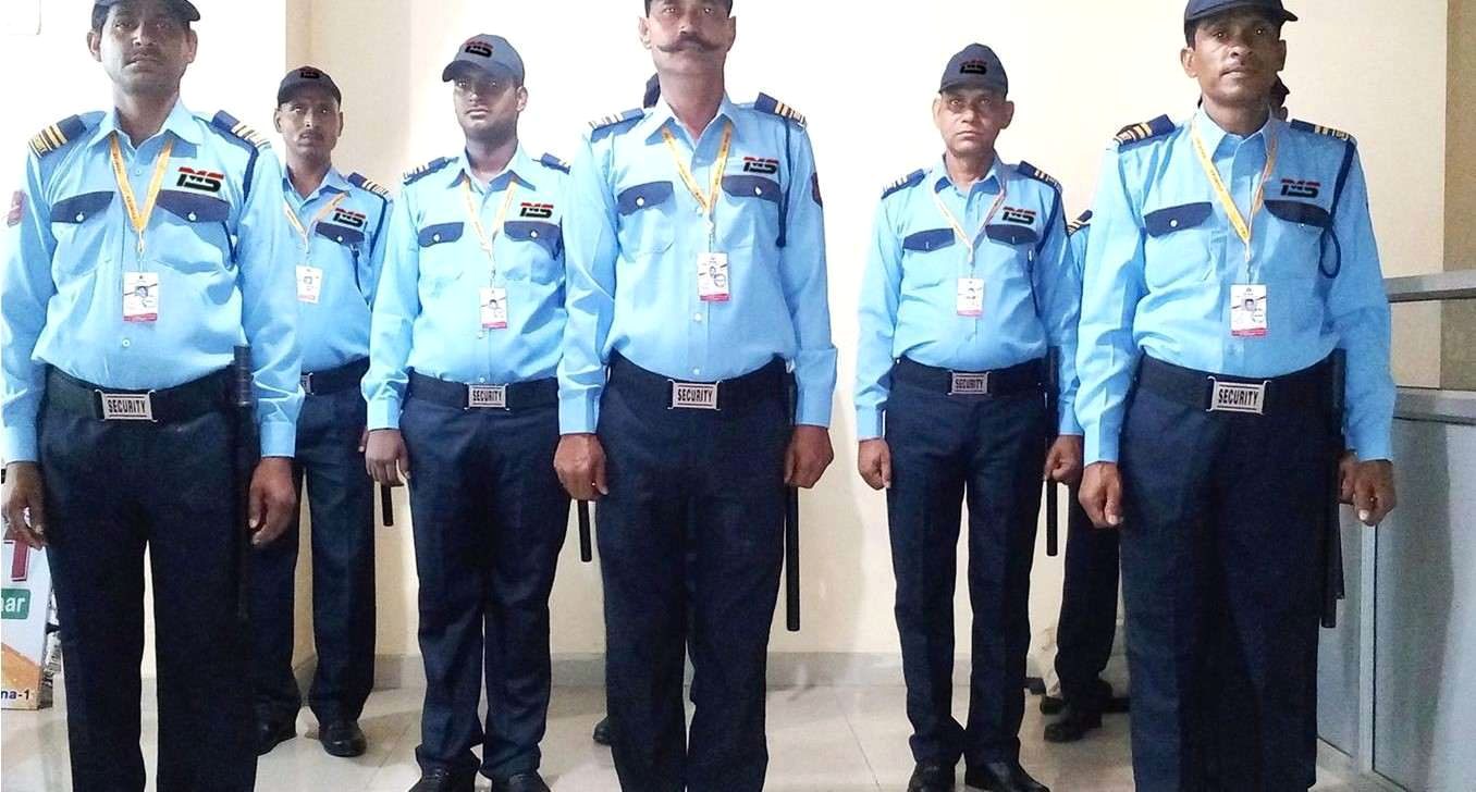 TMS security team standing in formation in uniform